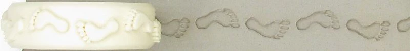 Rélyéf rolka stopy ludzkie tłoczona 14x50mm